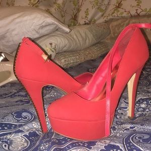 Red Platforms with Gold Embellishments